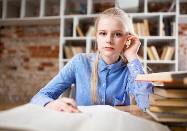 teen doing homework